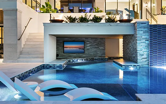 Elegant condo with large windows and pool area in Coral Gables, FL.