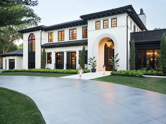 Elegant new construction home with a pool, representing luxury property listings in Coral Gables, FL