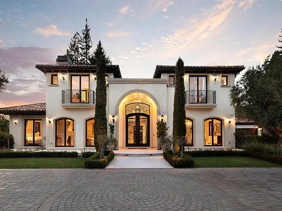 Luxury home with modern design and spacious driveway, representing premier real estate listings in Doral, FL